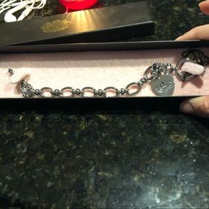 Juicy Couture bracelet w/toggle and heart charm.